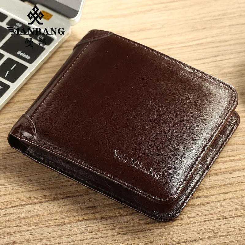 【Couro de couro genuíno】Manbang marca venda quente carteira masculina de luxo original curto tri-fold primeira camada bolsa de negócios